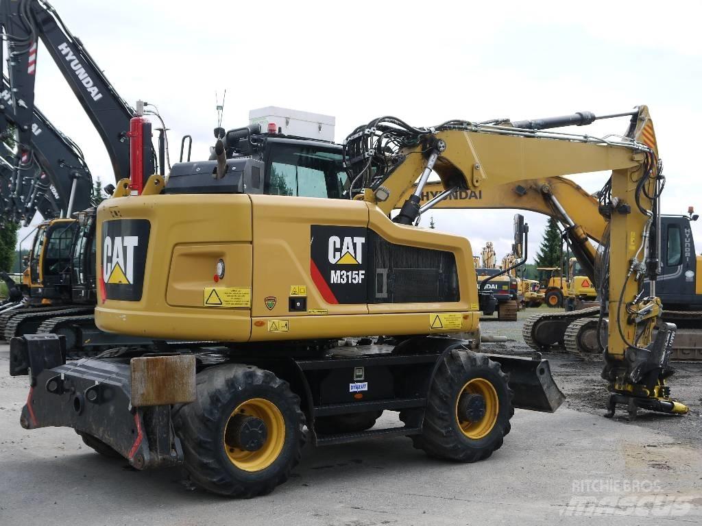 CAT M 315 F Ratiniai ekskavatoriai
