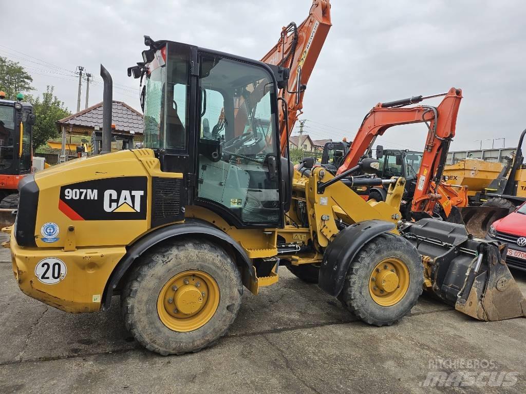 CAT 907M Naudoti ratiniai krautuvai