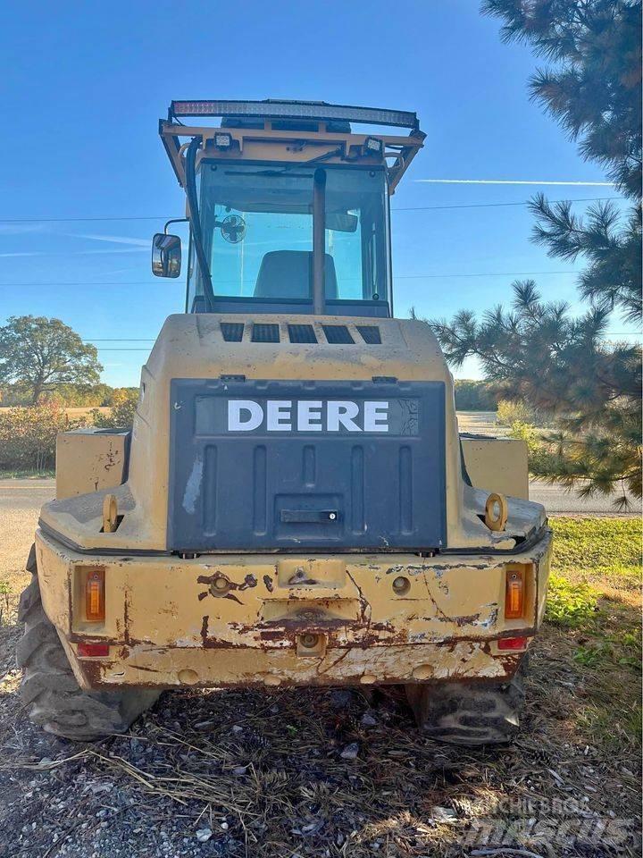 John Deere 324H Naudoti ratiniai krautuvai
