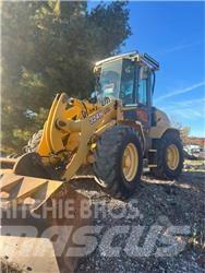 John Deere 324H Naudoti ratiniai krautuvai