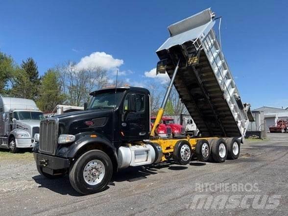 Peterbilt 567 Savivarčių priekabų vilkikai