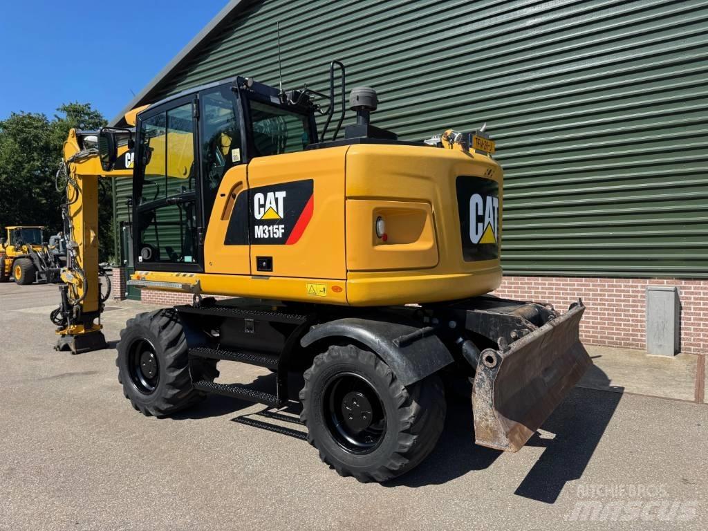 CAT M 315 F Ratiniai ekskavatoriai