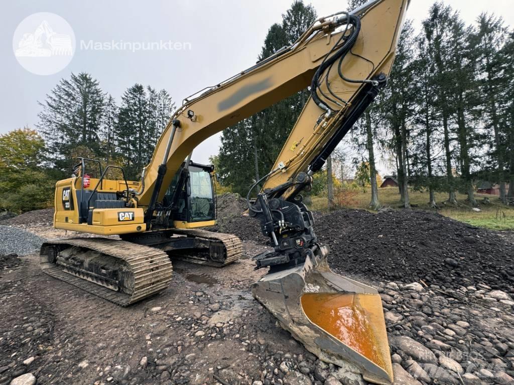 CAT 323 Vikšriniai ekskavatoriai