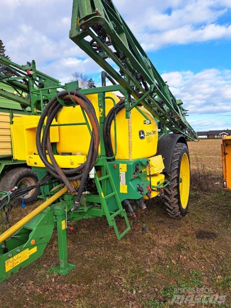 John Deere 740 i Prikabinami purkštuvai