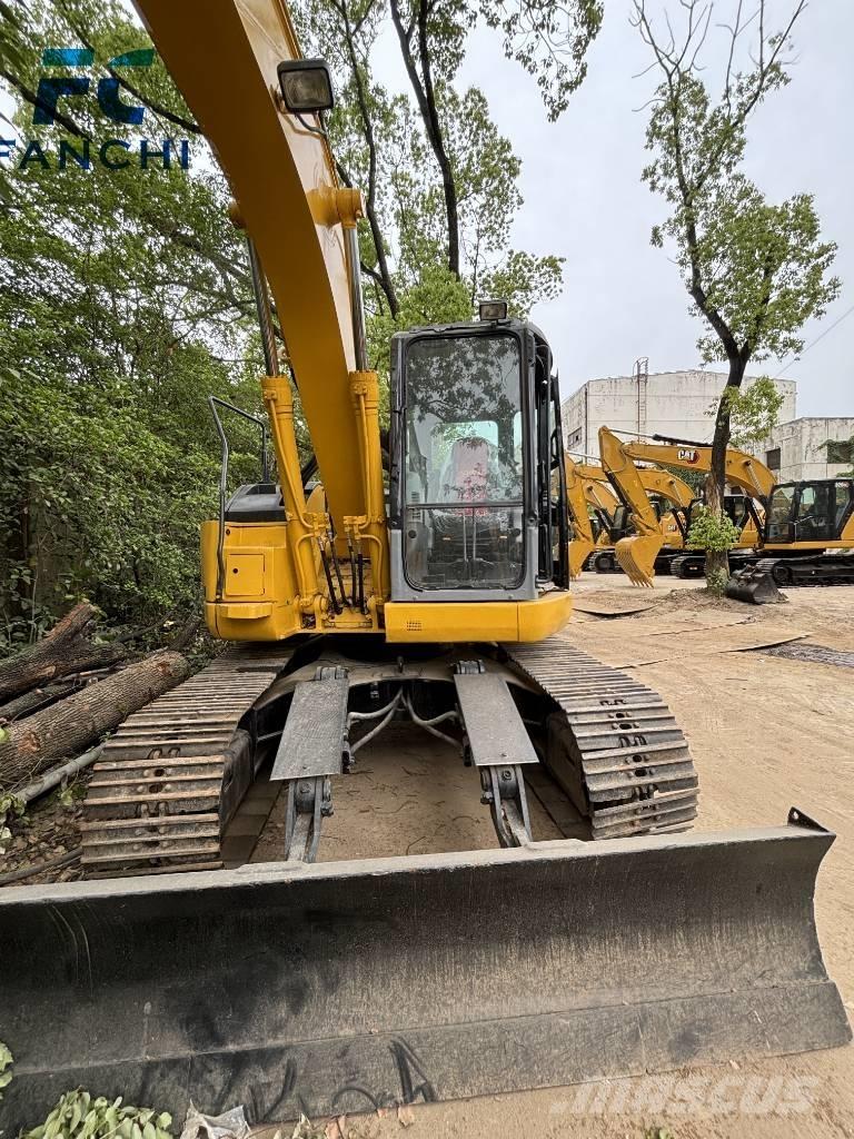 Komatsu PC 128 US Vikšriniai ekskavatoriai