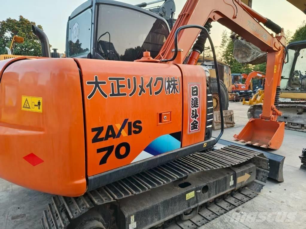 Hitachi ZX 70 Vidutinės galios ekskavatoriai 7-12 t