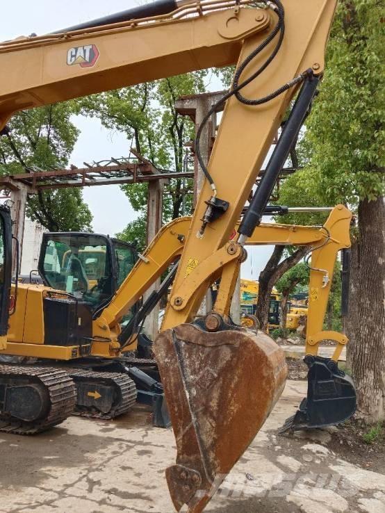 CAT 310 Vikšriniai ekskavatoriai