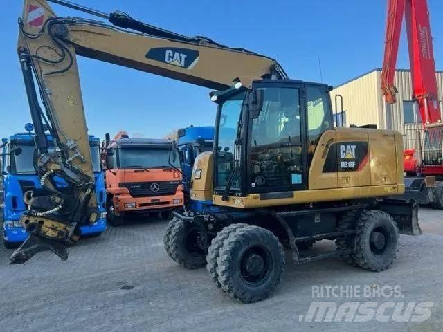 CAT M 318 F Ratiniai ekskavatoriai