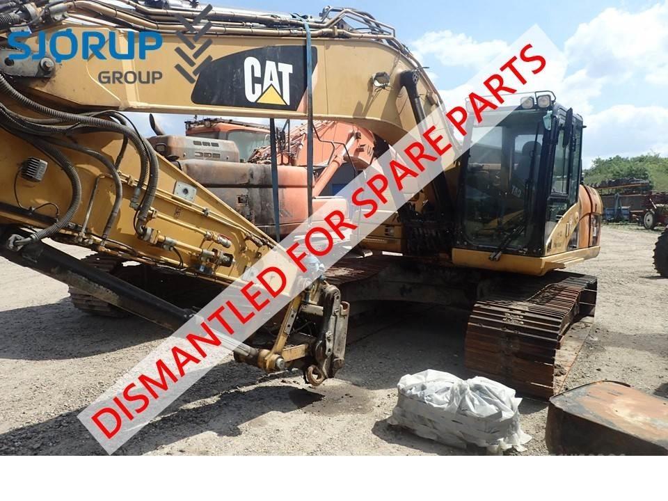 CAT 323D Traktoriai