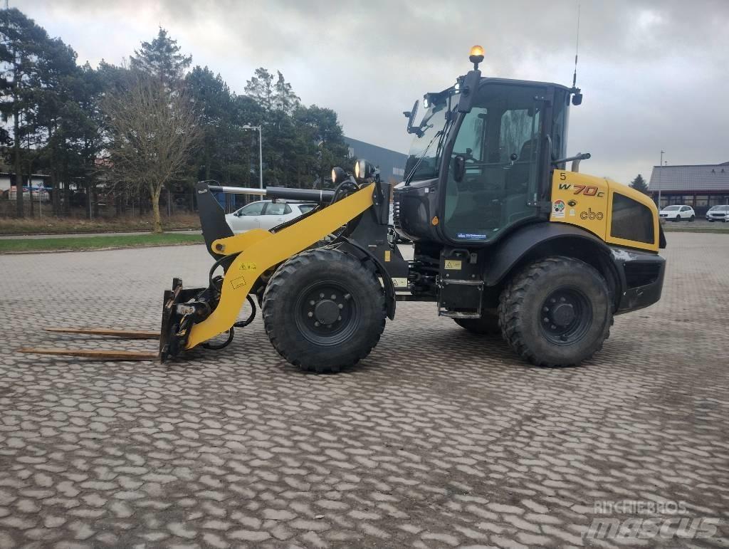 New Holland W70C Naudoti ratiniai krautuvai