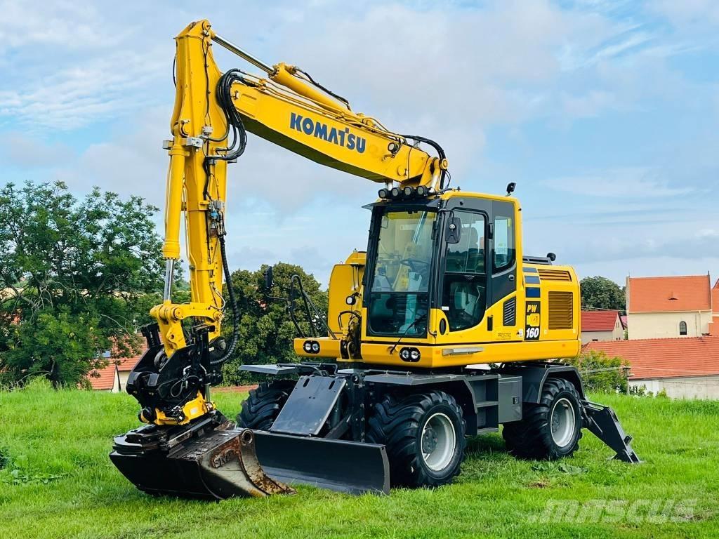 Komatsu PW 160 - 10 Ratiniai ekskavatoriai