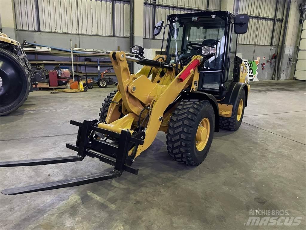 CAT 906 Naudoti ratiniai krautuvai
