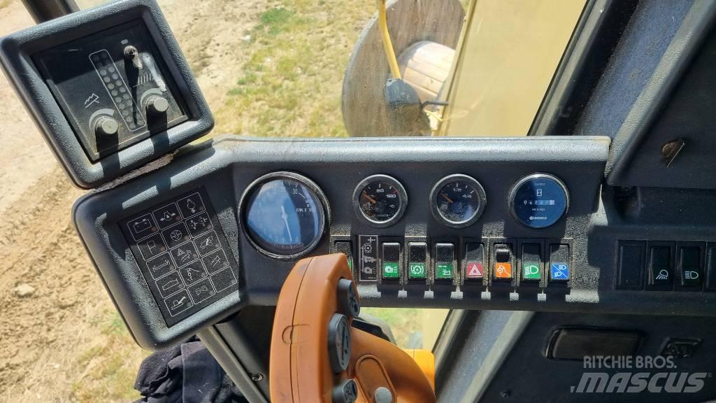 New Holland TC 56 Derliaus nuėmimo kombainai
