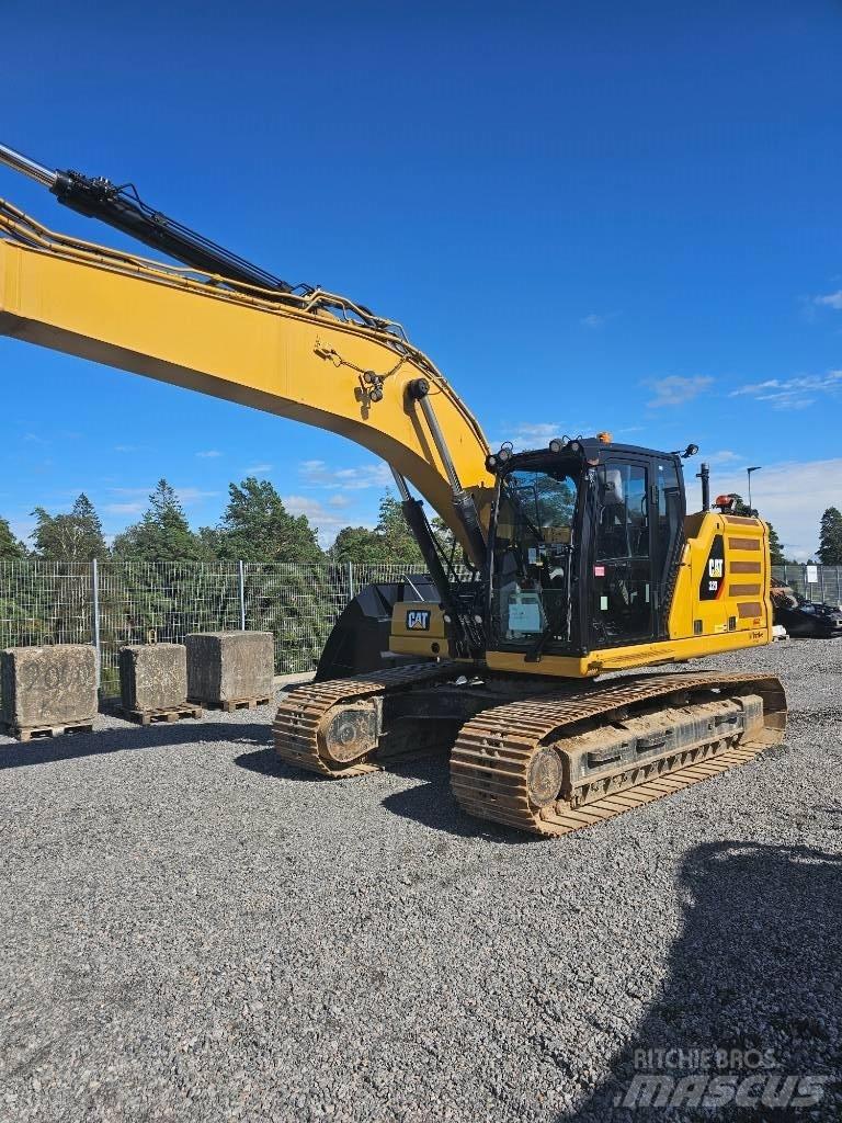 CAT 323 Vikšriniai ekskavatoriai