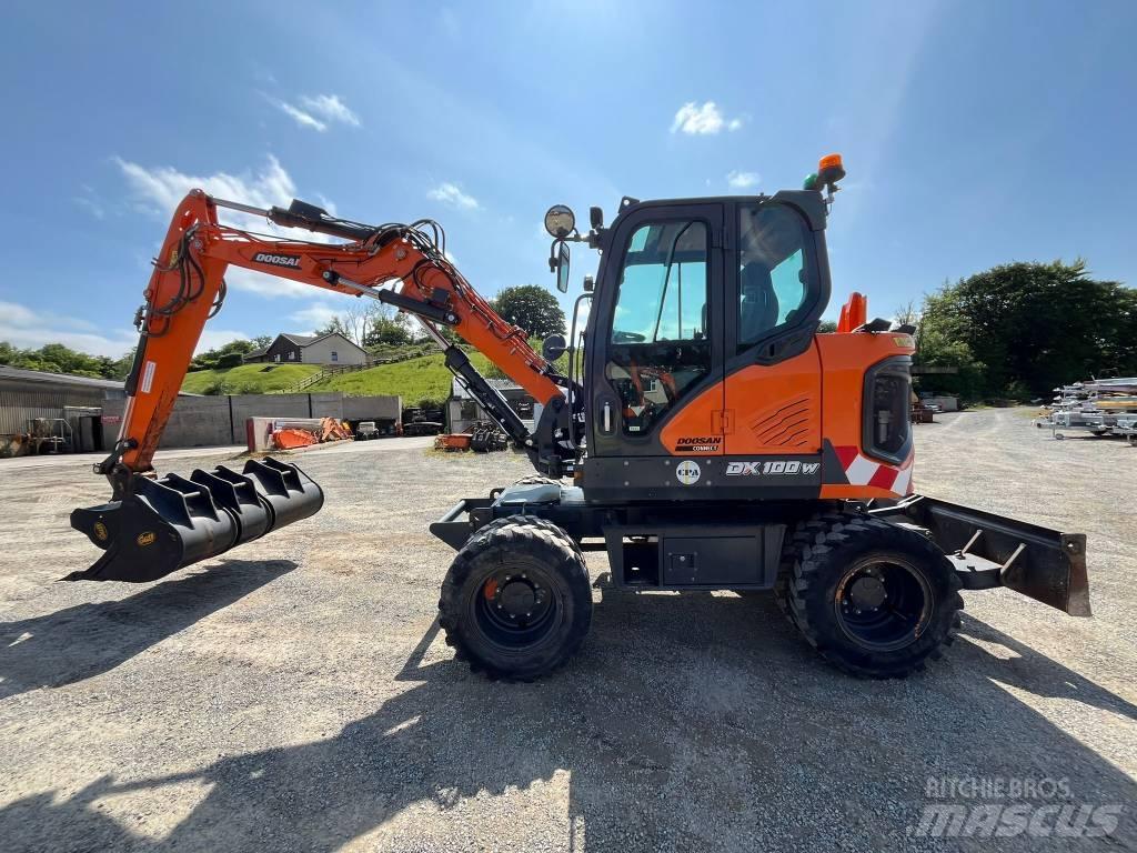 Develon DX 100 W-7 Ratiniai ekskavatoriai