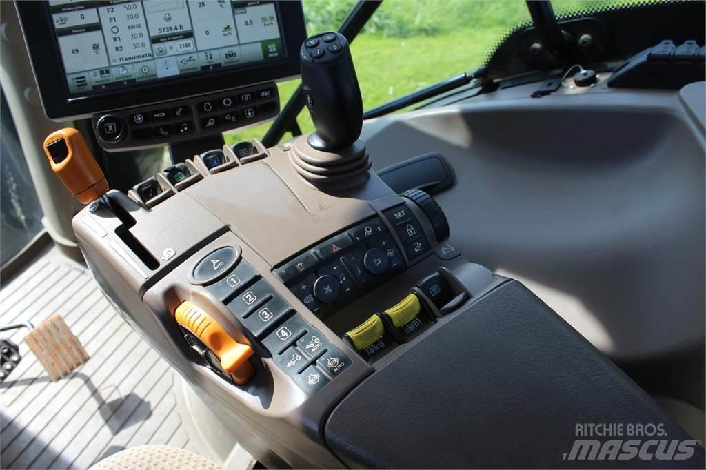 John Deere 6215R Traktoriai