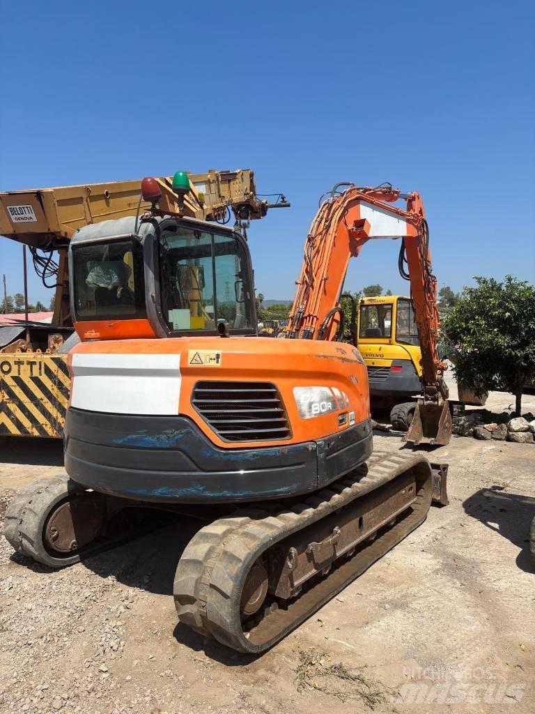 Doosan DX 80 R Vidutinės galios ekskavatoriai 7-12 t