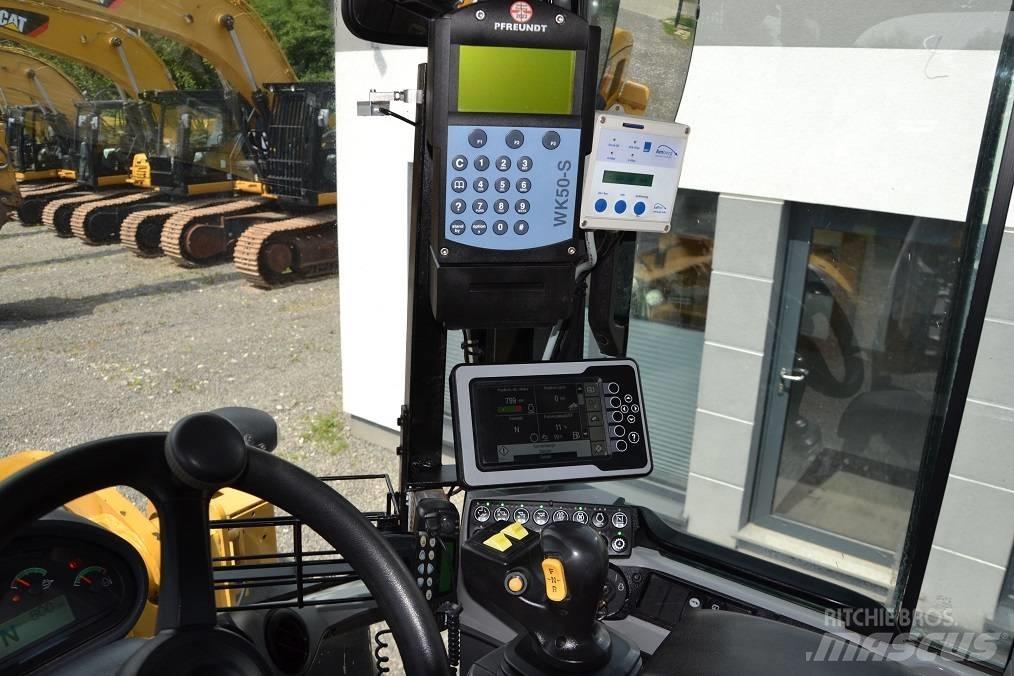 CAT 938 M Naudoti ratiniai krautuvai