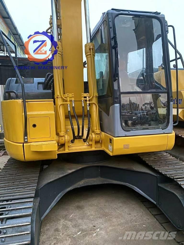Komatsu PC 128 US Vidutinės galios ekskavatoriai 7-12 t