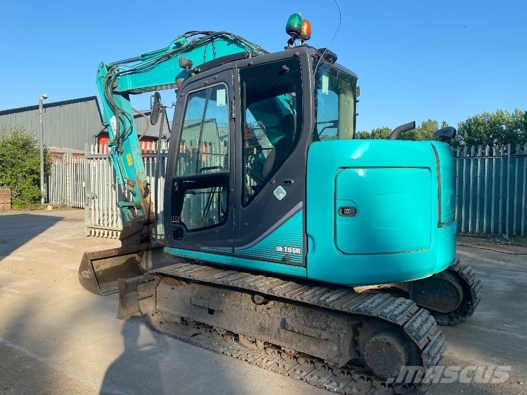 Kobelco Sk75-7 Vidutinės galios ekskavatoriai 7-12 t