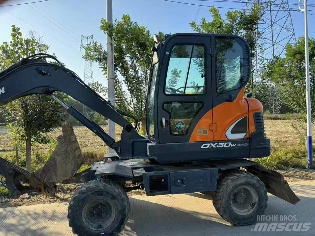 Doosan DX60W Ratiniai ekskavatoriai