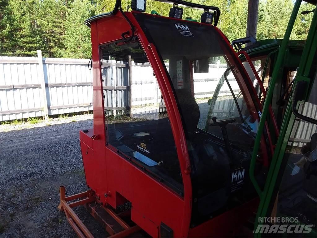 Komatsu 951 Kabinos ir salonai