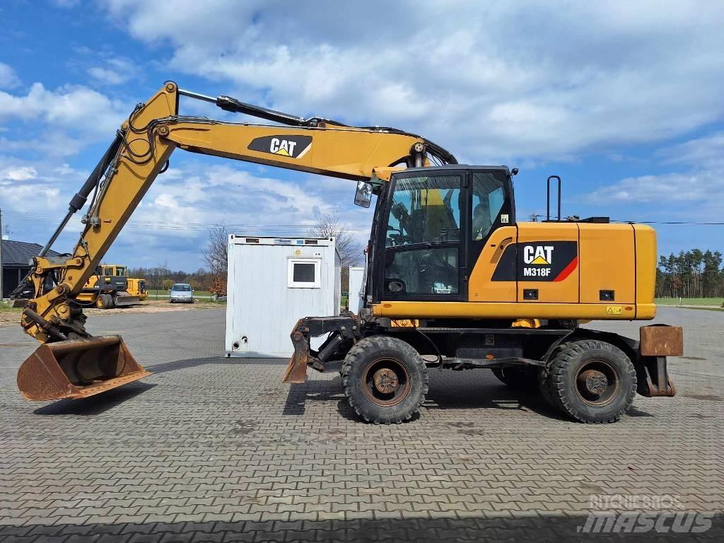 CAT M 318 F Ratiniai ekskavatoriai