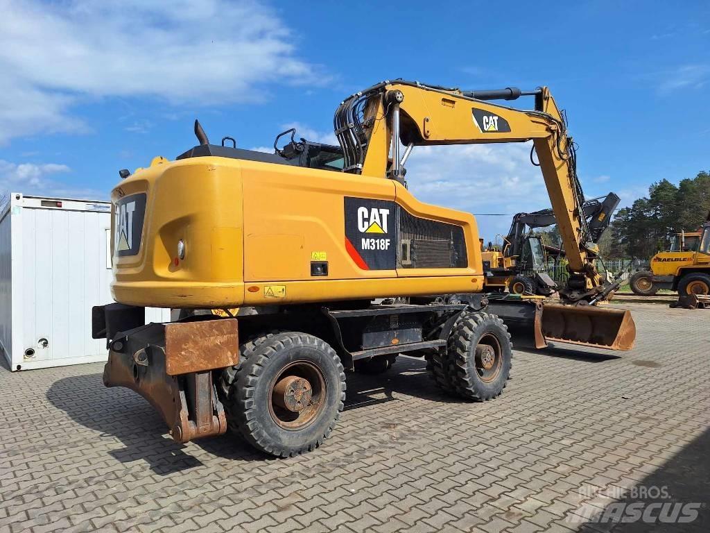 CAT M 318 F Ratiniai ekskavatoriai