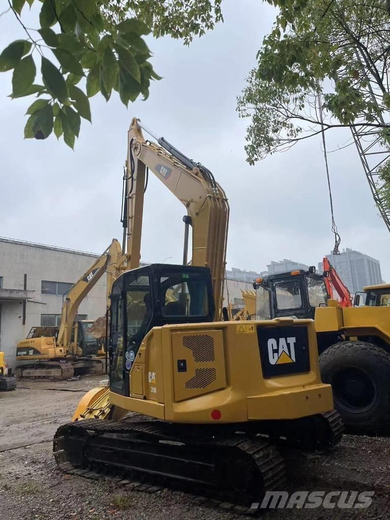 CAT 310 Vikšriniai ekskavatoriai