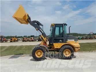 John Deere 244K Naudoti ratiniai krautuvai