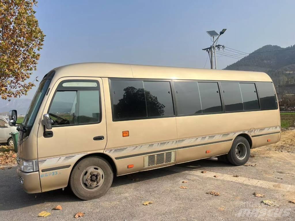 Toyota Coaster Tarpmiestiniai autobusai