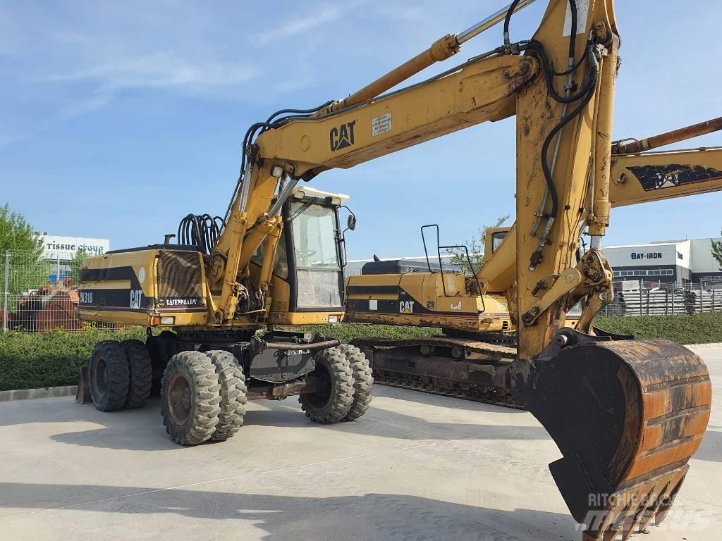 CAT M 318 Ratiniai ekskavatoriai