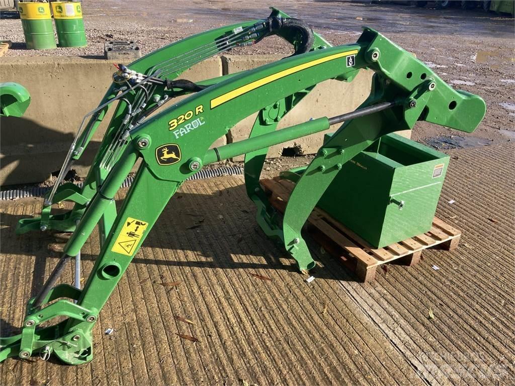John Deere 320R Naudoti kompaktiški traktoriai