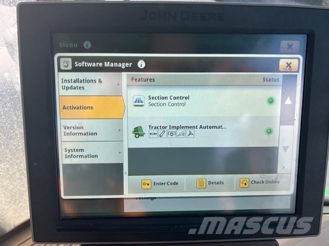 John Deere 6215R Traktoriai