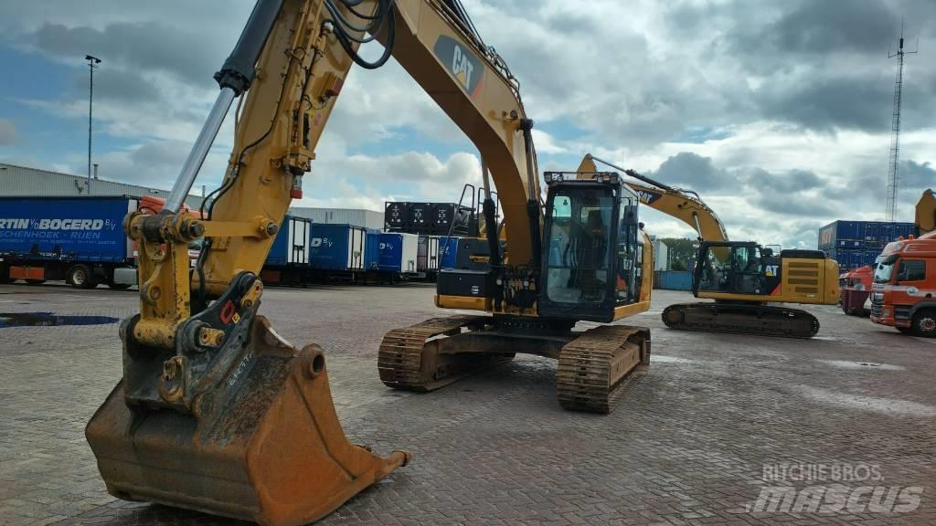 CAT 323 EL Vikšriniai ekskavatoriai