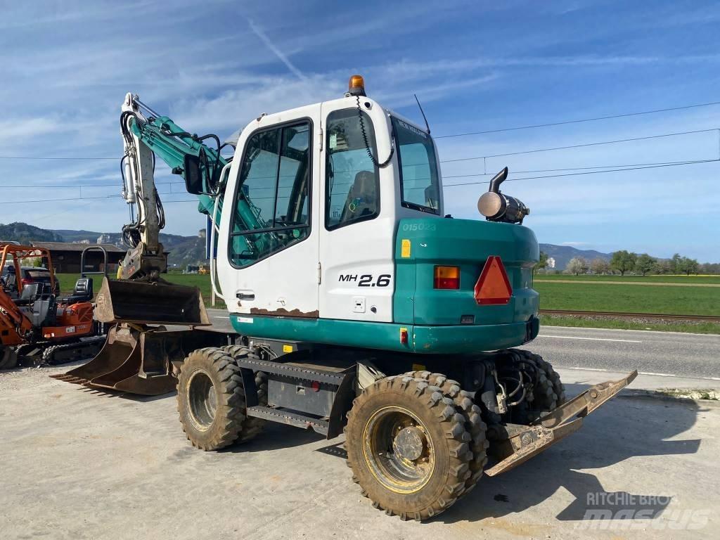 New Holland MH 2.6 Ratiniai ekskavatoriai