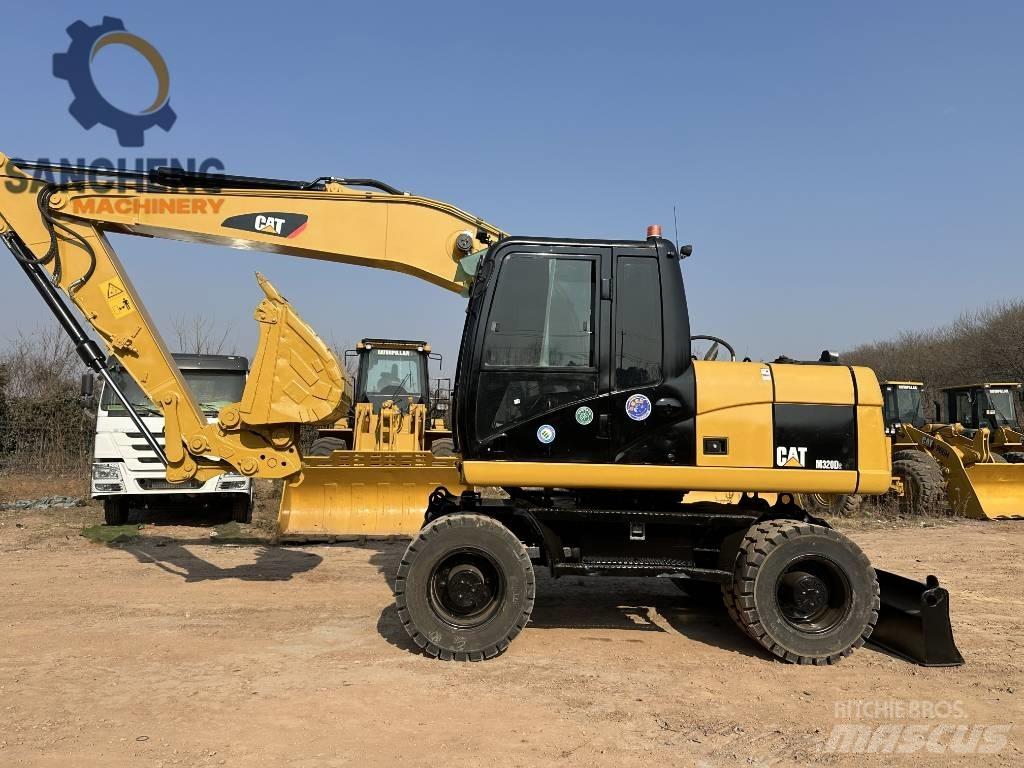 CAT M 320 D2 Ratiniai ekskavatoriai