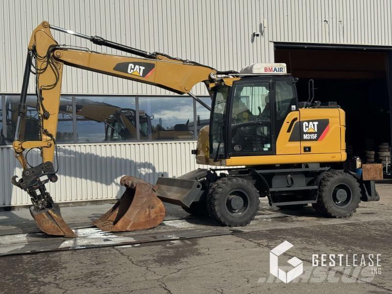 CAT M315F Ratiniai ekskavatoriai