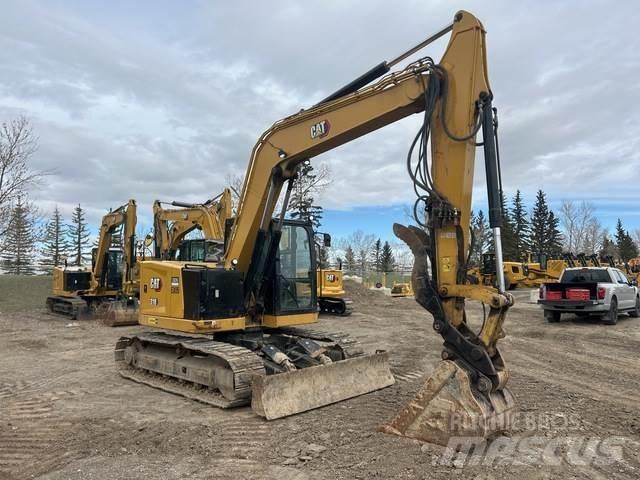 CAT 310 Vikšriniai ekskavatoriai