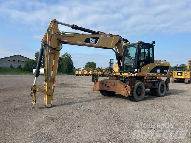 CAT M318D Ratiniai ekskavatoriai