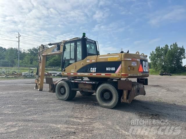 CAT M318D Ratiniai ekskavatoriai