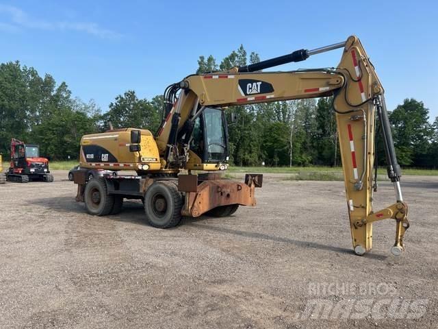 CAT M318D Ratiniai ekskavatoriai
