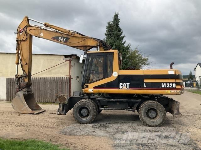 CAT M320 Ratiniai ekskavatoriai