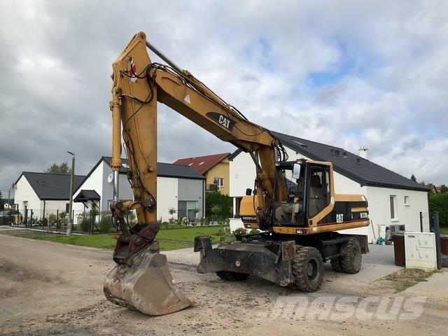 CAT M320 Ratiniai ekskavatoriai