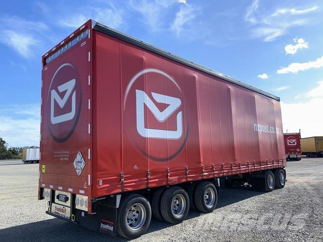 Fruehauf  Priekabos su tentu