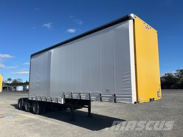 Fruehauf  Priekabos su tentu