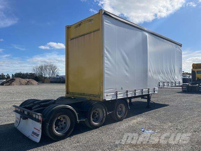 Fruehauf  Priekabos su tentu