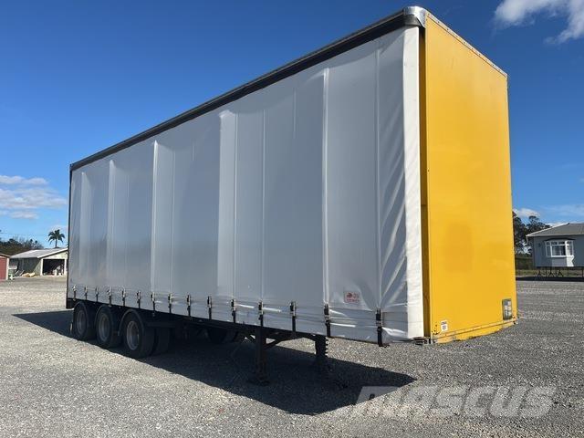 Fruehauf  Priekabos su tentu