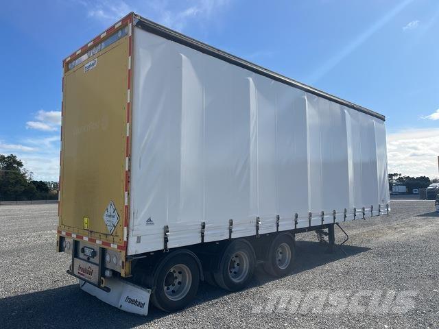 Fruehauf  Priekabos su tentu