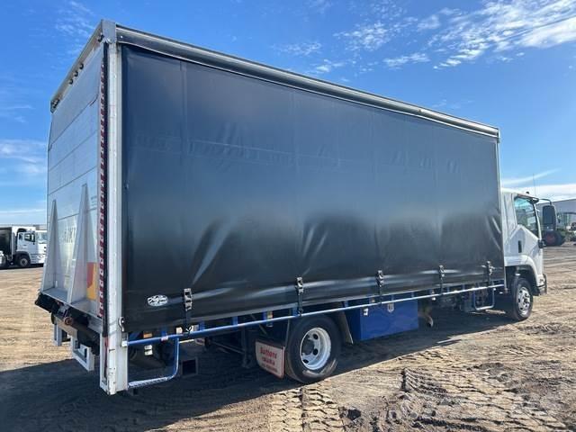 Isuzu FRR 600 Priekabos su tentu